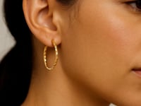 14k Yellow Gold Slender Hoop Earring with Diamond-Cut Finish (25mm Diameter) 11