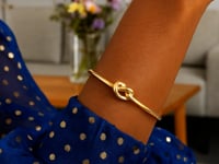 14k Yellow Gold Bangle Bracelet with Polished Knot (9.50 mm) 2